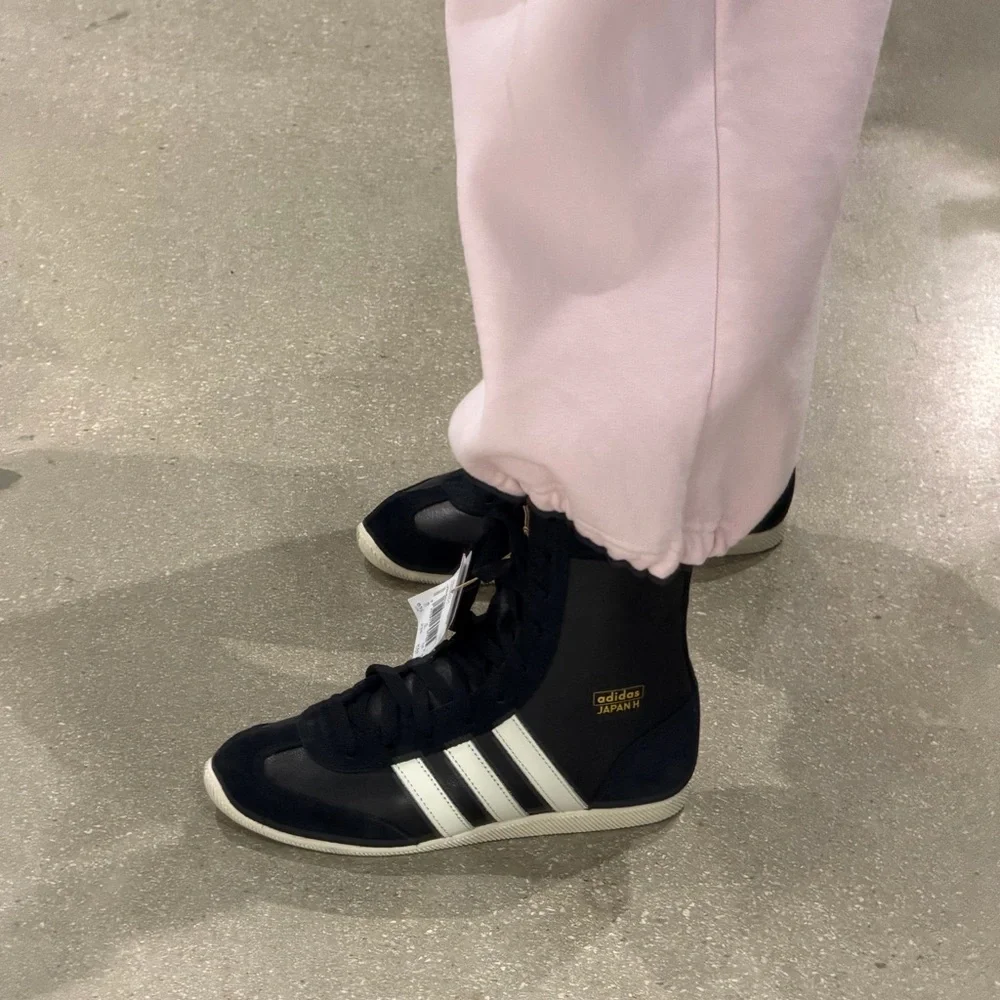 Adidas Black and White High-Tops